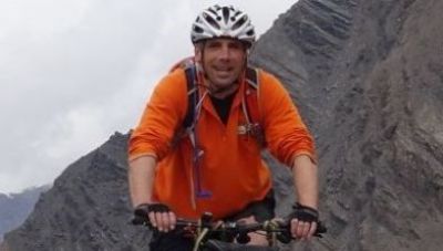 Bill Silvester Cycling on the  tour with redspokes